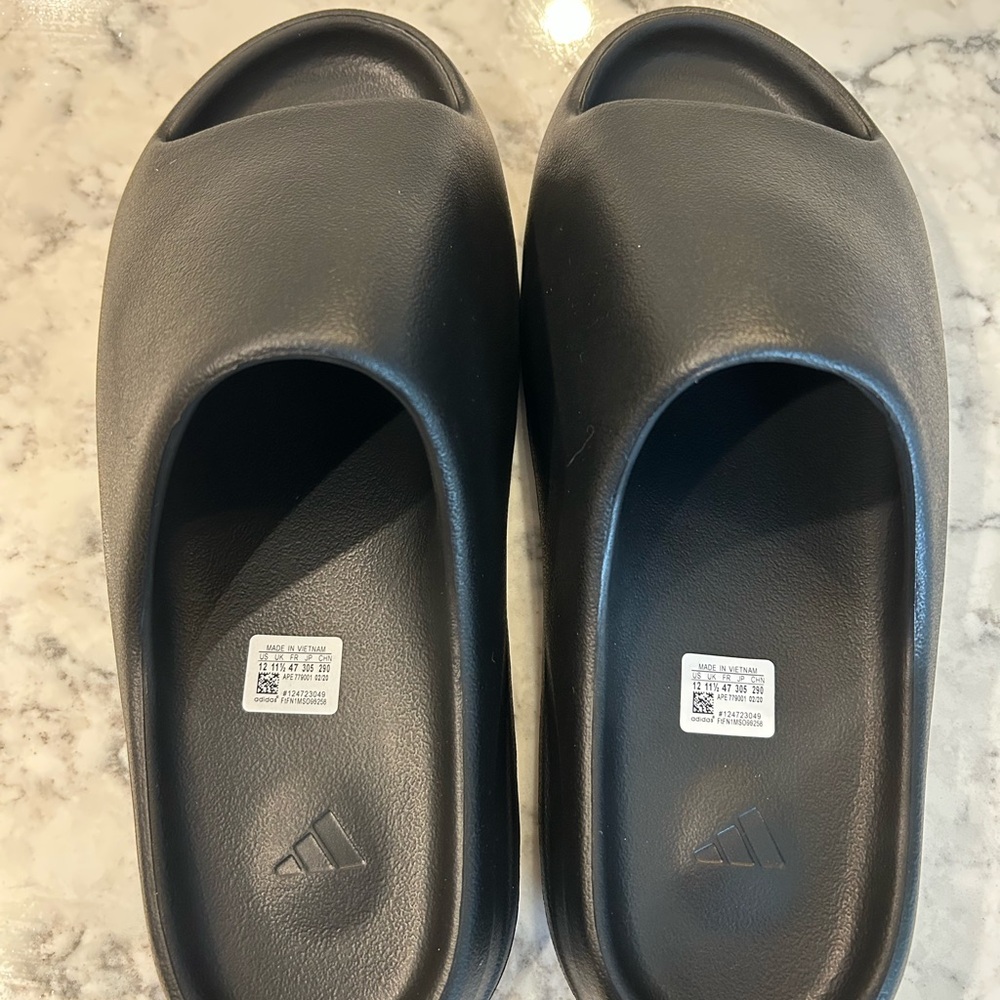 Brand new. Adidas. Black. Embossed Logo Slide